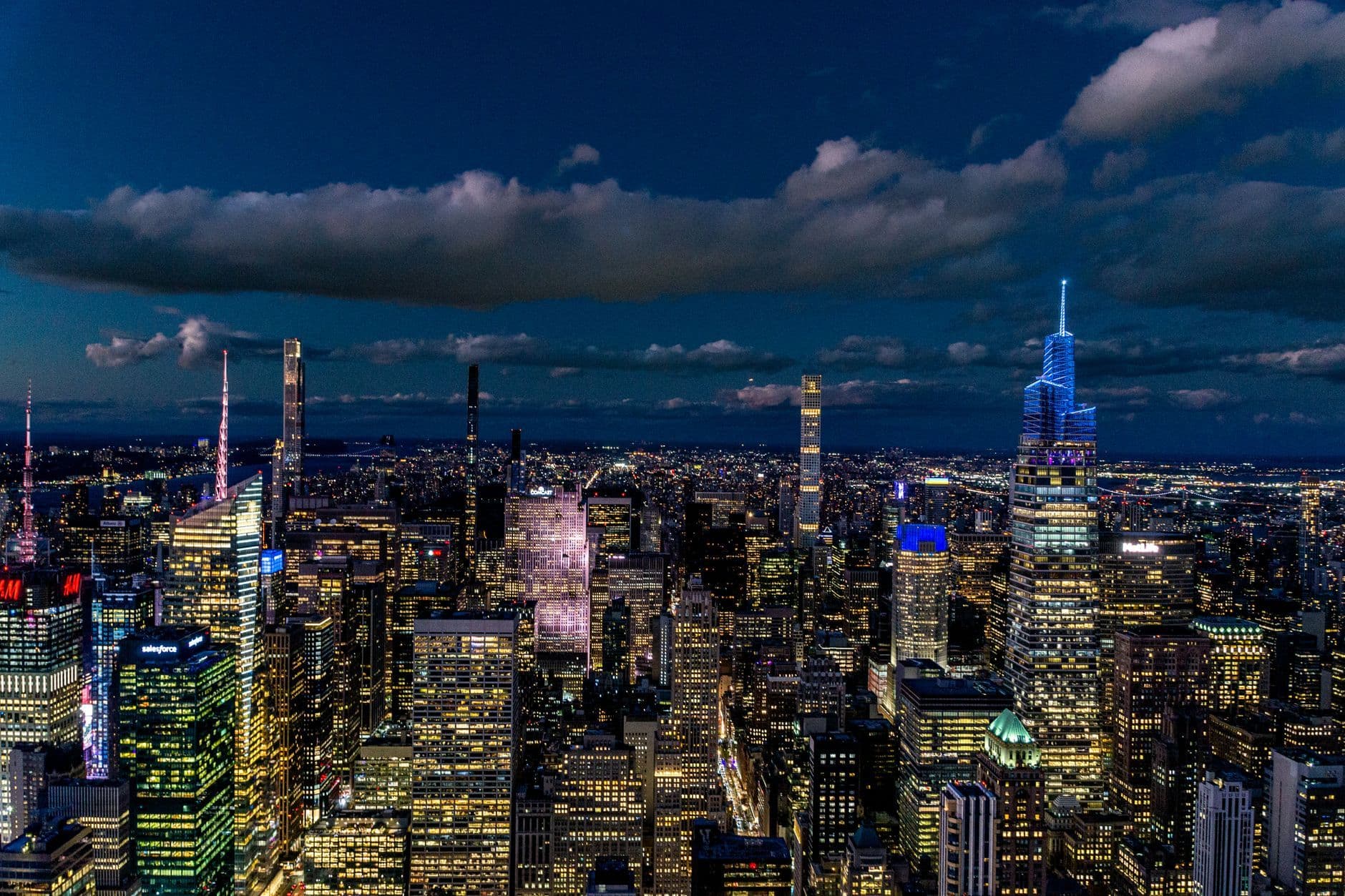 A breathtaking aerial view of New York City's illuminated skyline under the night sky.